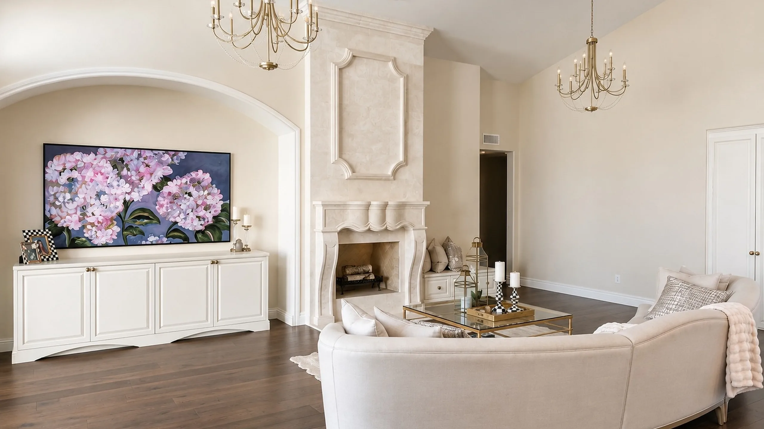Stylish living room featuring a floral painting, elegant furnishings, and a cozy ambiance, highlighting design insights.